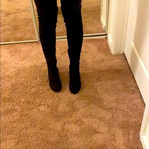 Thigh high black boots
